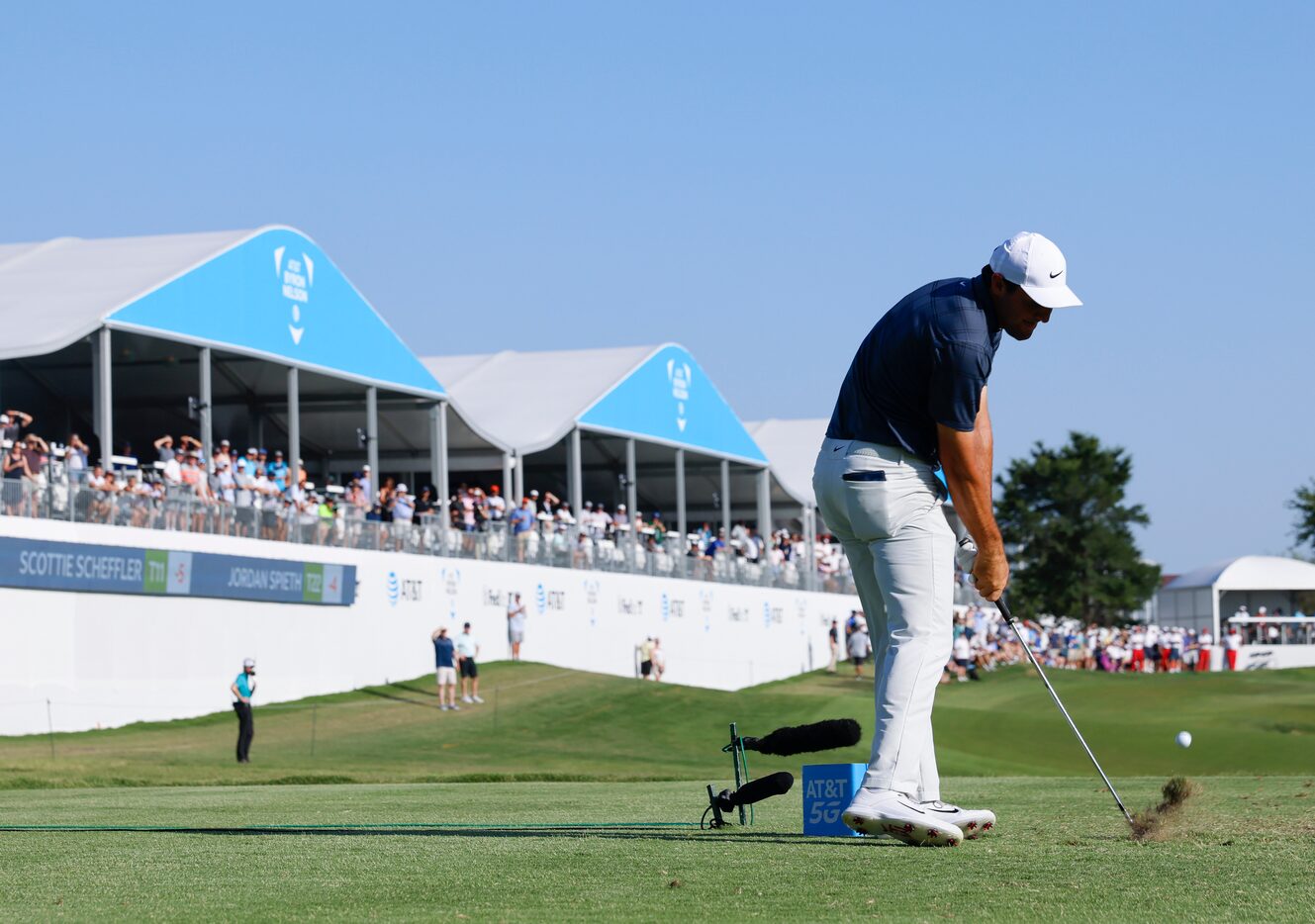 Scottie Scheffler tees off on no. 17 during  AT&T Byron Nelson on Thursday, May 12, 2022 at...