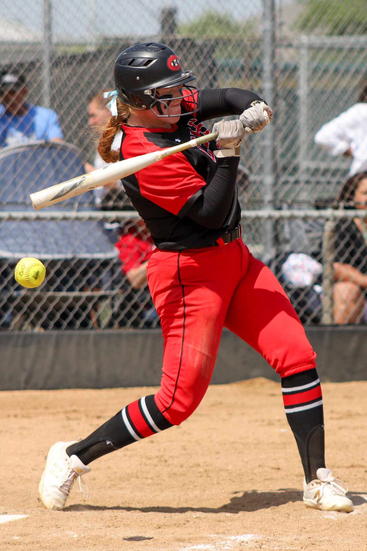Colleyville Heritage pitcher Presleigh Payne (24) swings for a pitch during a softball Class...