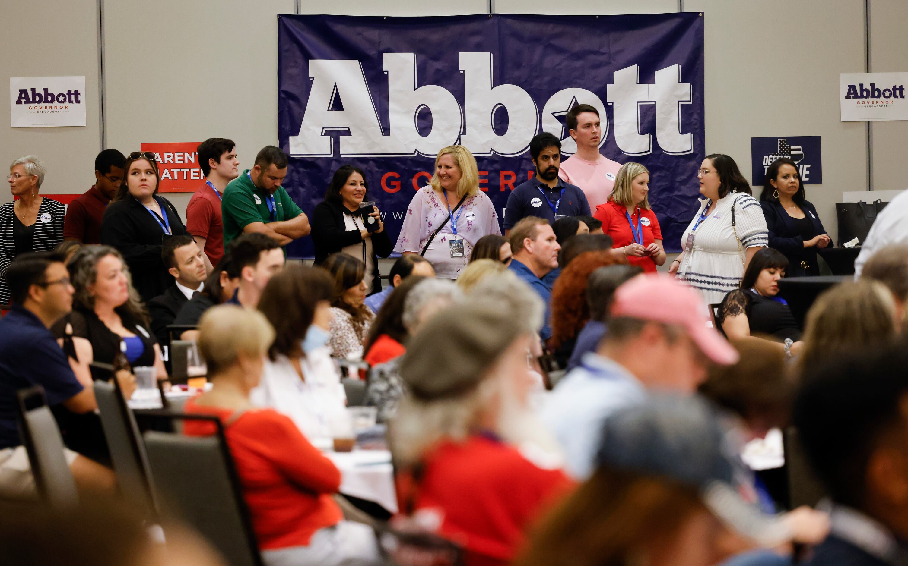 Crowd gathers at a debate watch party for Texas Governor Greg Abbott ahead of his arrival at...