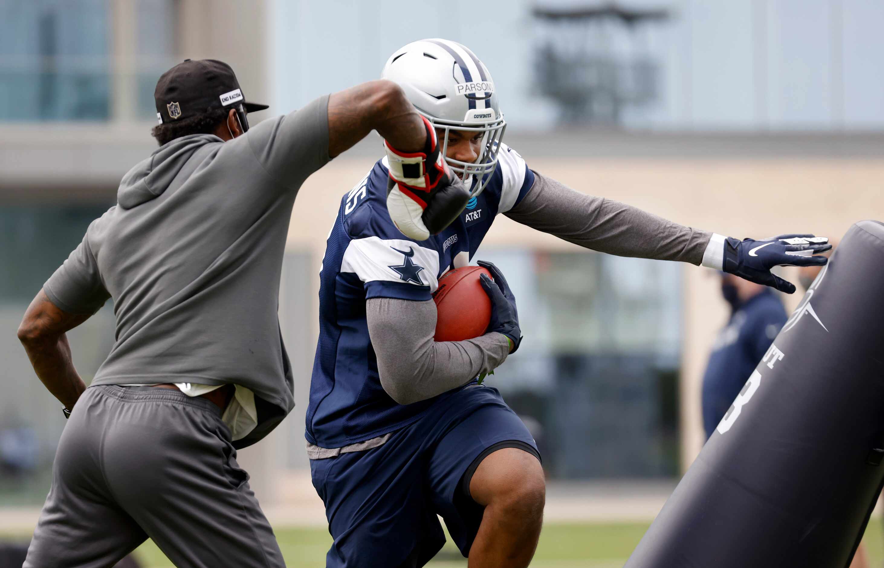 Dallas Cowboys rookie linebacker Micah Parsons (11) runs through drills during rookie...