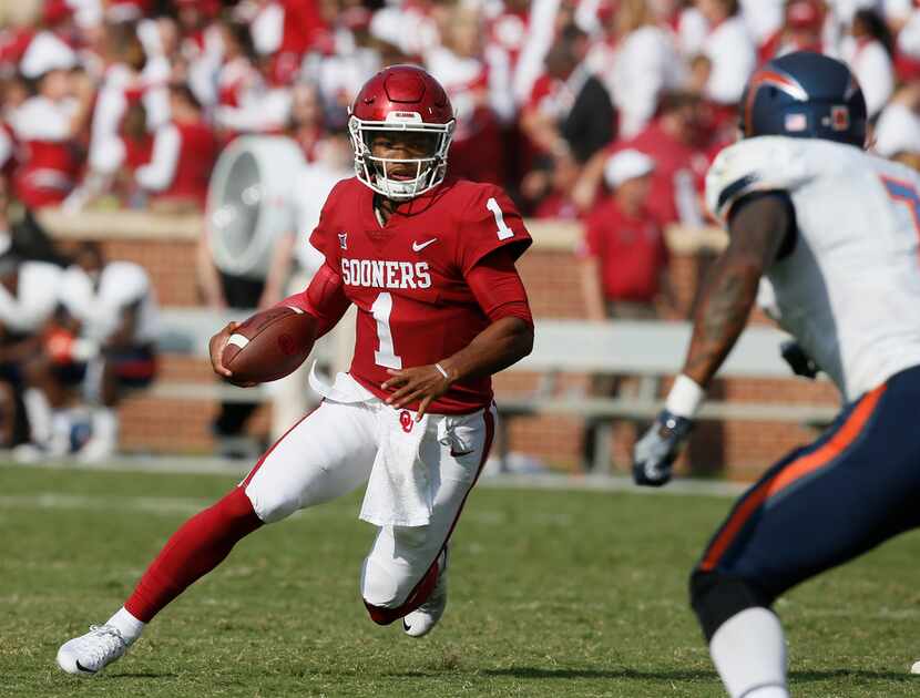 FILE - In this Sept. 2, 2017, file photo, Oklahoma quarterback Kyler Murray (1) carries...