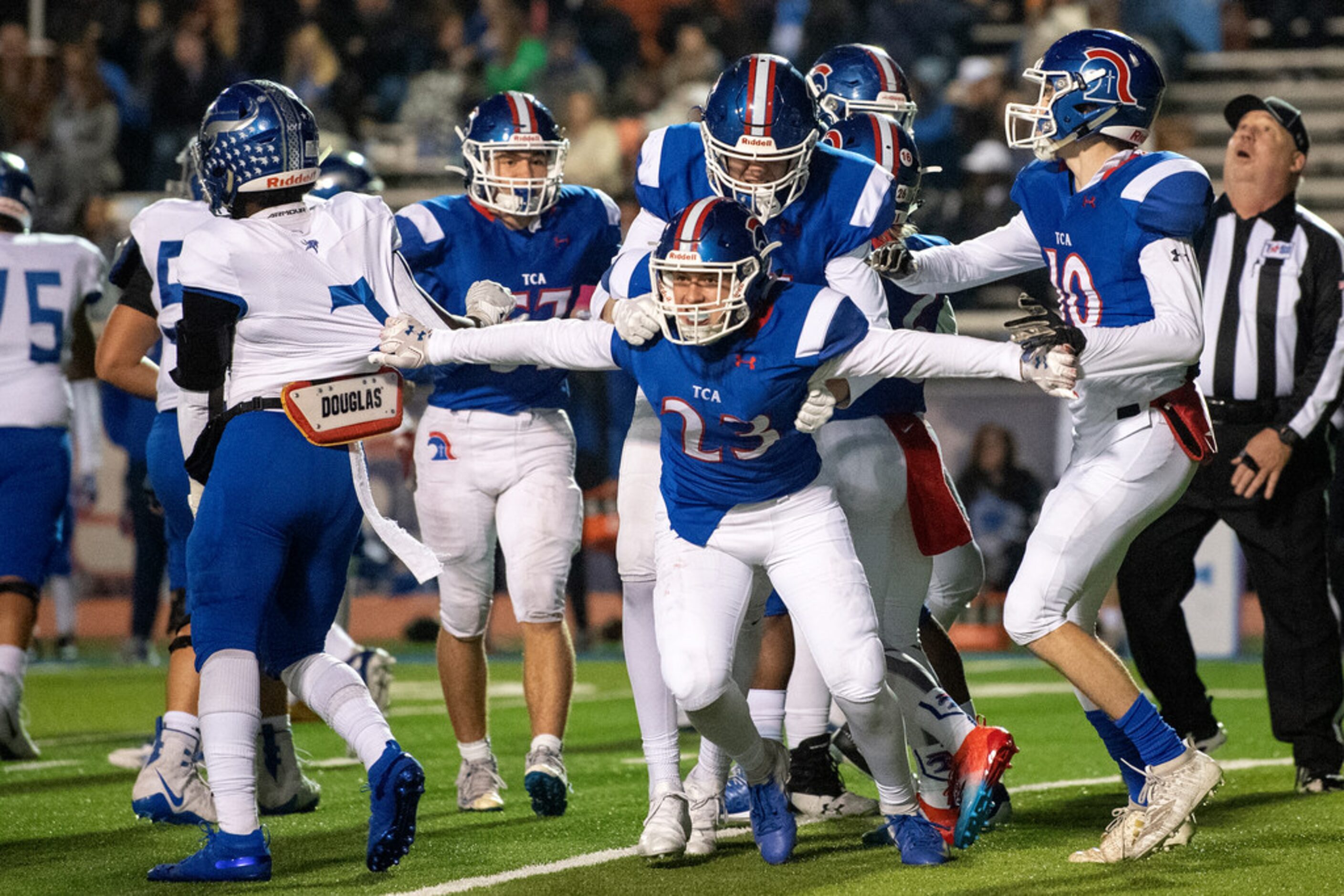 TCA-Addison freshman safety Chance Snyder (23) celebrates an interception against Fort Worth...