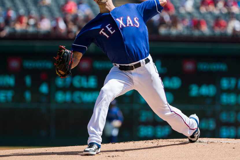 Texas Rangers starting pitcher Mike Minor (23) pitches during the first inning of an MLB...