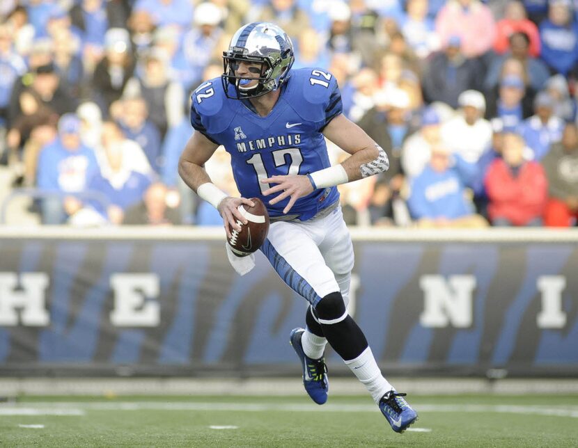 Nov 29, 2014; Memphis, TN, USA; Memphis Tigers quarterback Paxton Lynch (12) runs with the...