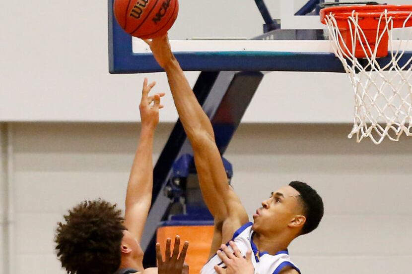 Garland Lakeview's Zhaire Smith (34), pictured blocking a shot against Denton Guyer, is...