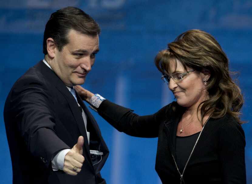 Sen. Ted Cruz, R-Texas, greeted Former Alaska Gov. Sarah Palin after introducing her at the...
