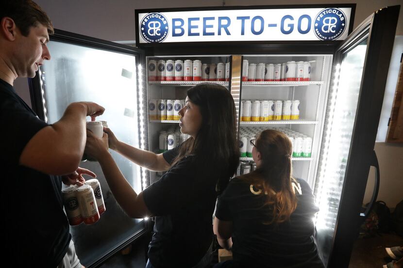 Michael Peticolas, the brewery's owner, said he was proud of how efficiently the staff was...