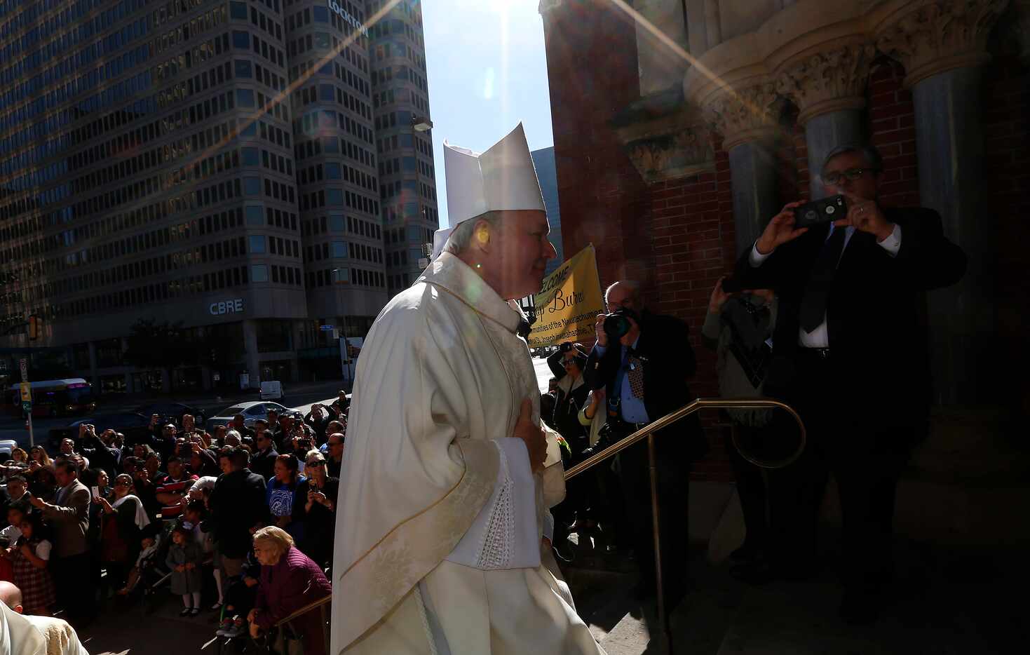 Bishop Edward J. Burns enters the Cathedral Shrine of the Virgin of Guadalupe for an...