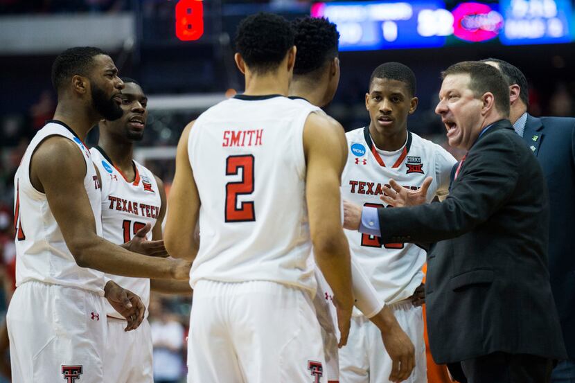 Texas Tech Red Raiders head coach Chris Beard talks to players during the second half of a...