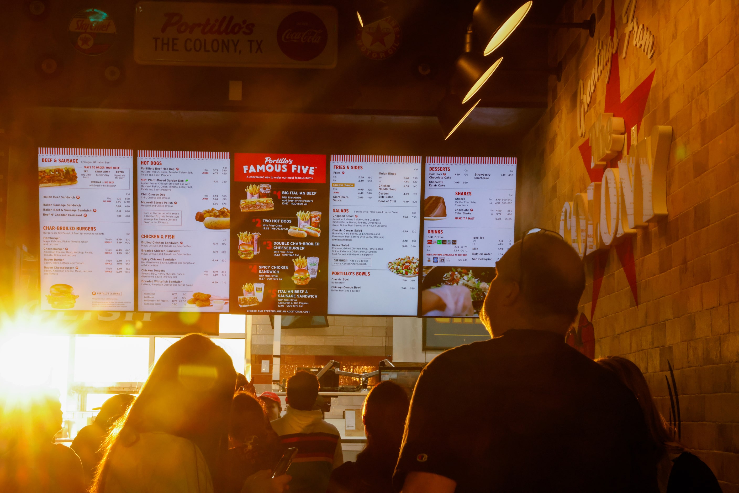 A line forms in the lobby of the new Portillo’s in The Colony to order on Monday, Jan. 9, 2023.