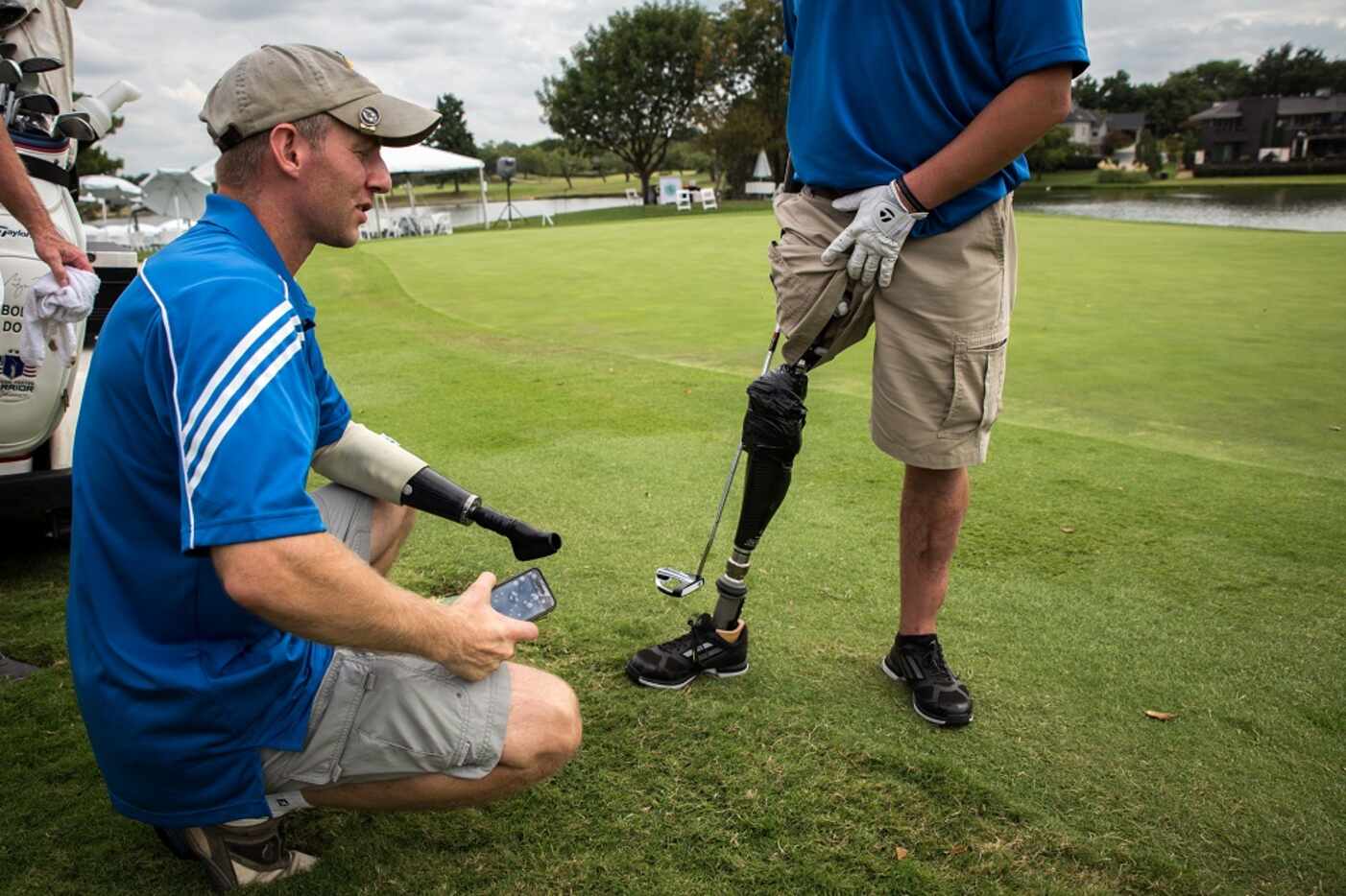 Ken Dwyer (left) jerry-rigged Bobby Dove's prosthetic leg, splinting it with his arm parts...