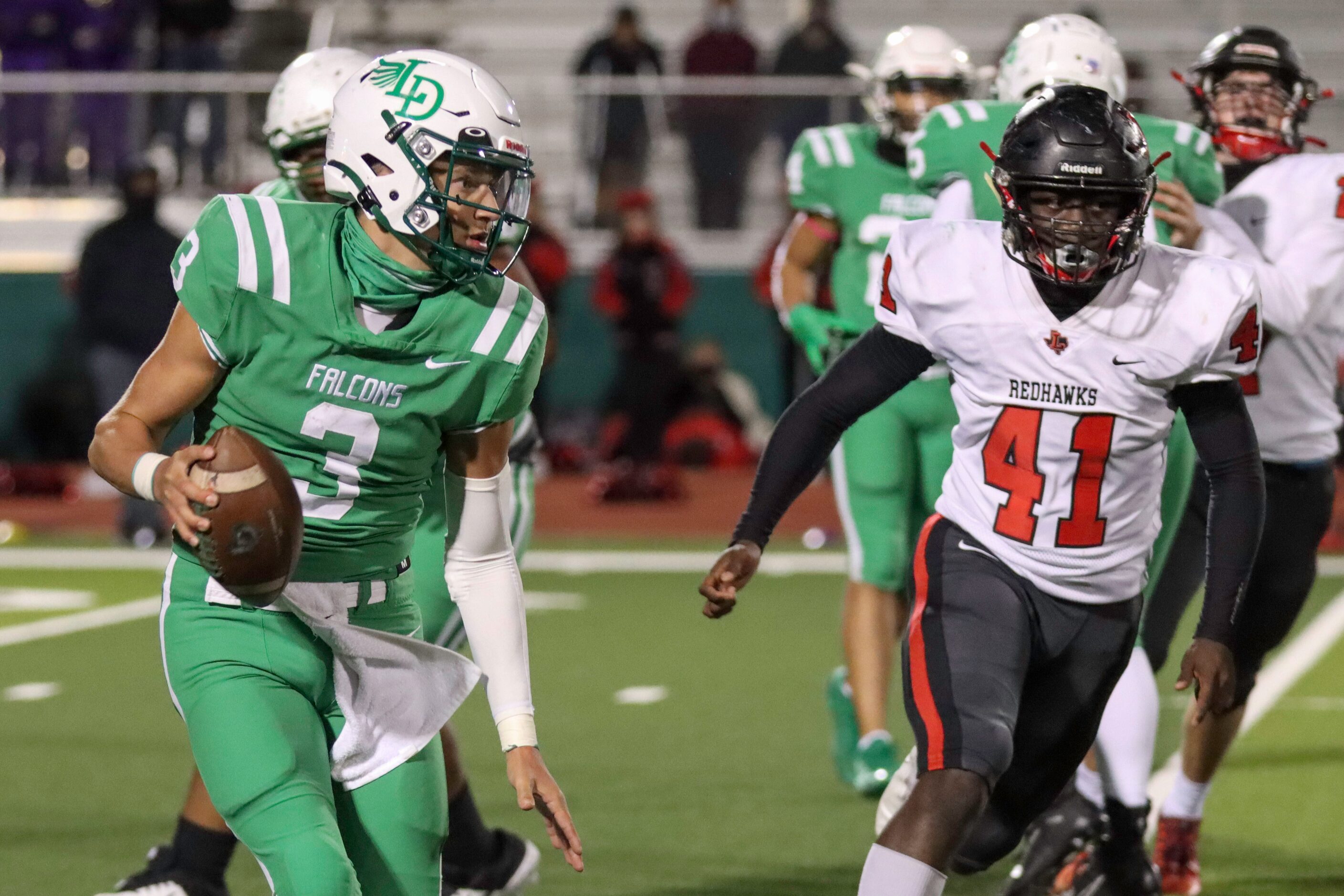 Lake Dallas quarterback Brendan Sorsby (3) looks to pass against Frisco Liberty defensive...