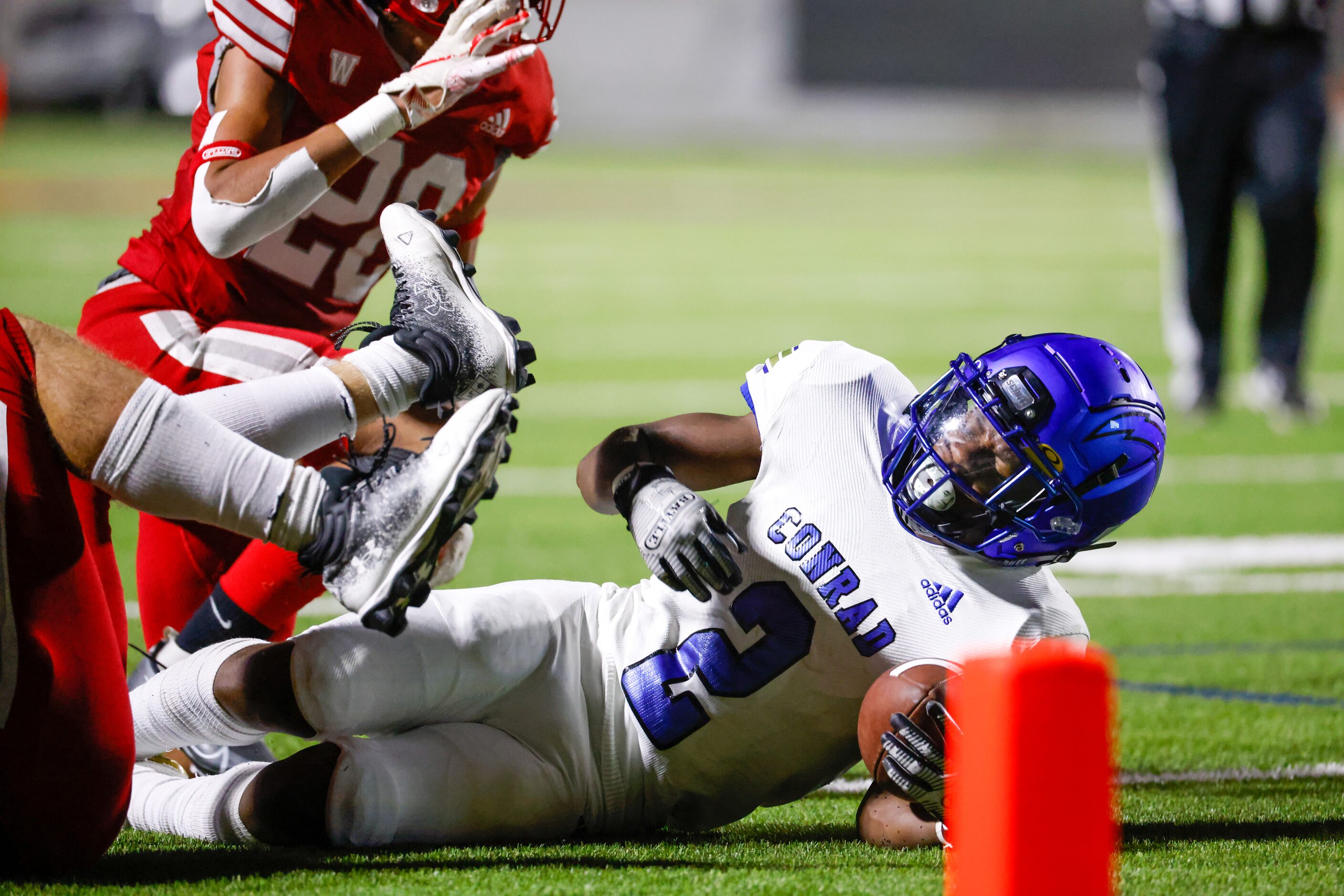 Conrad running back Carlos Walker (2) lands just short of the end zone during the first half...