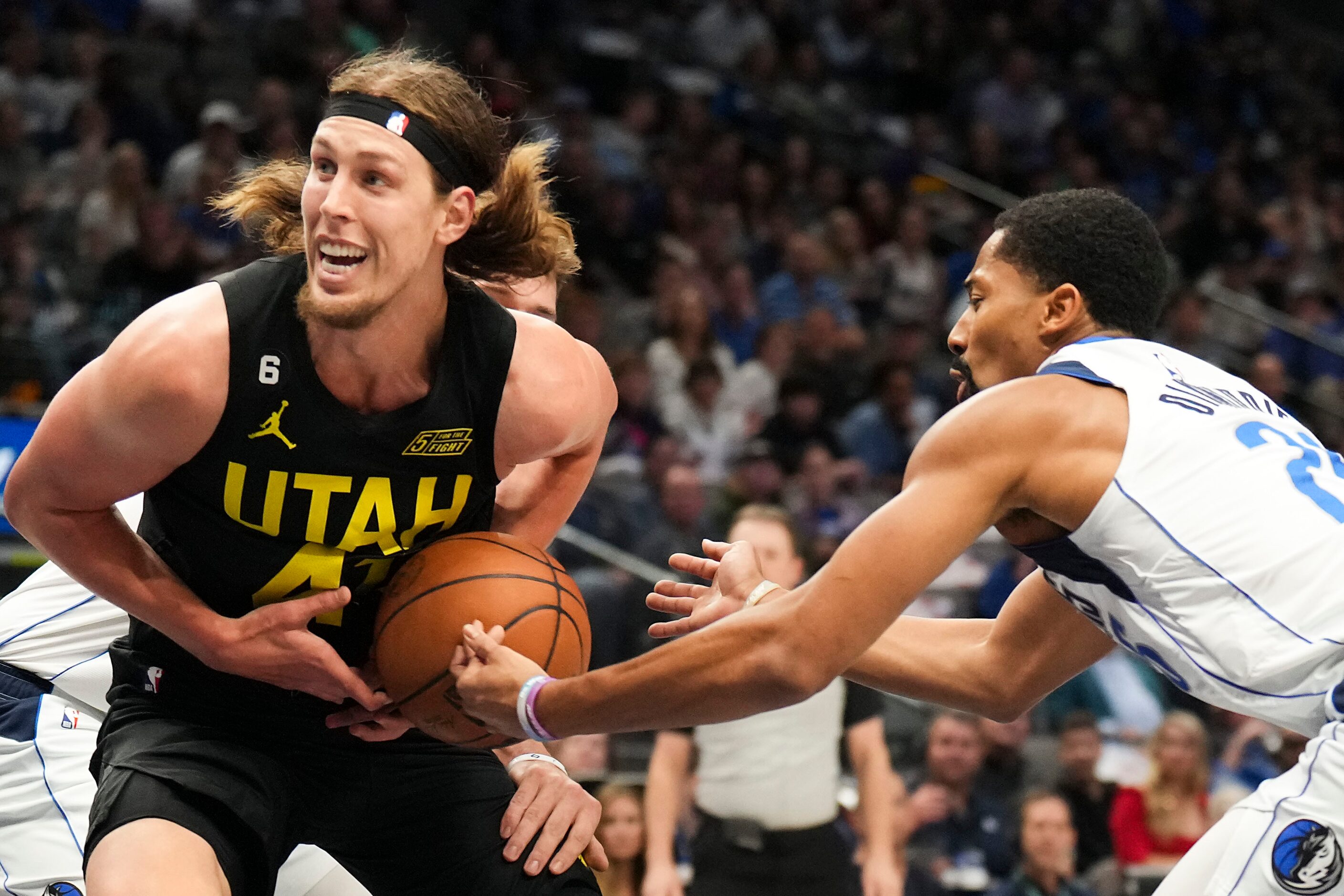 Dallas Mavericks guard Spencer Dinwiddie (26) steals the ball from Utah Jazz forward Kelly...