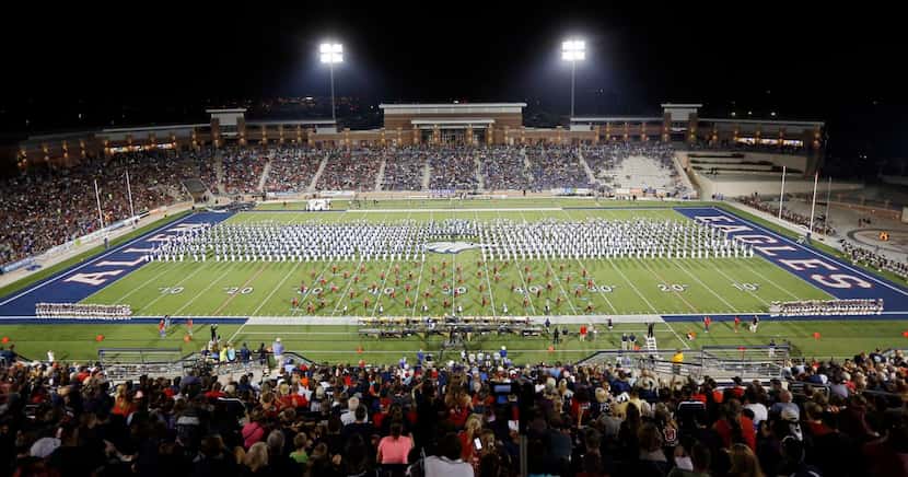 
The Allen High School marching band performs at halftime during a game against Denton Guyer...
