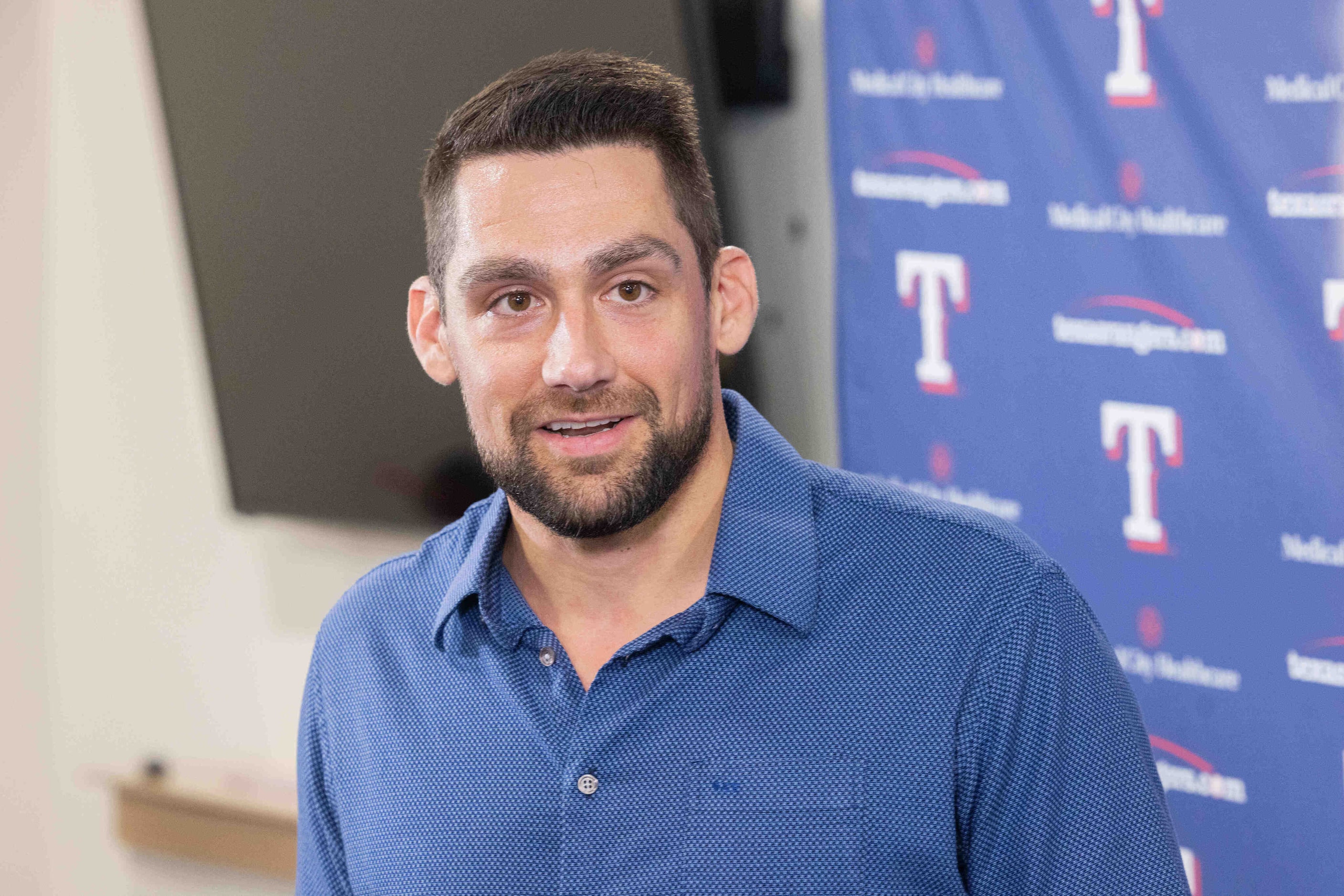 Texas Rangers starting pitcher Nathan Eovaldi speaks during a press conference announcing...