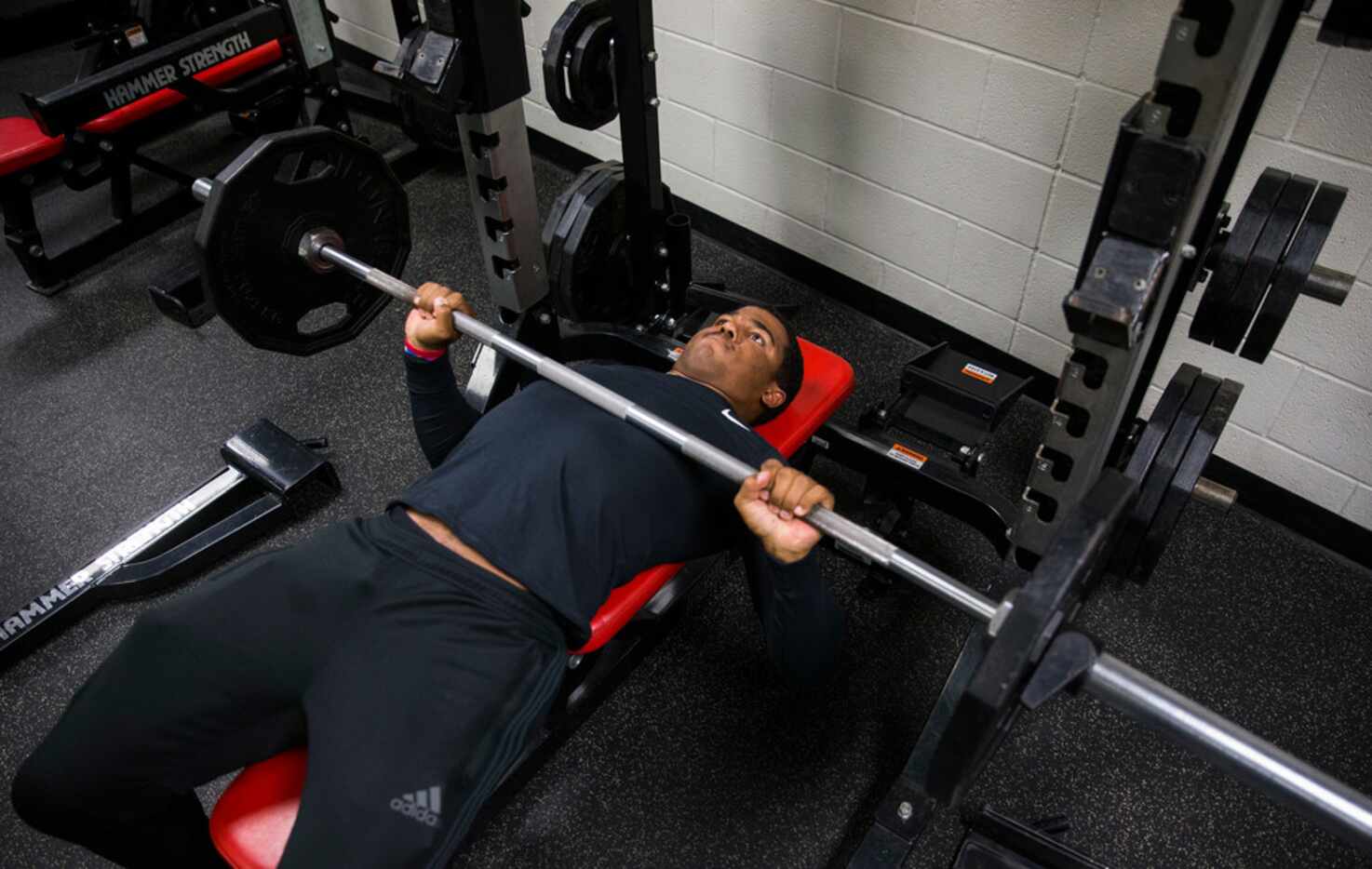 Mansfield Legacy football player Jalen Catalon works out in the weight room on Thursday,...