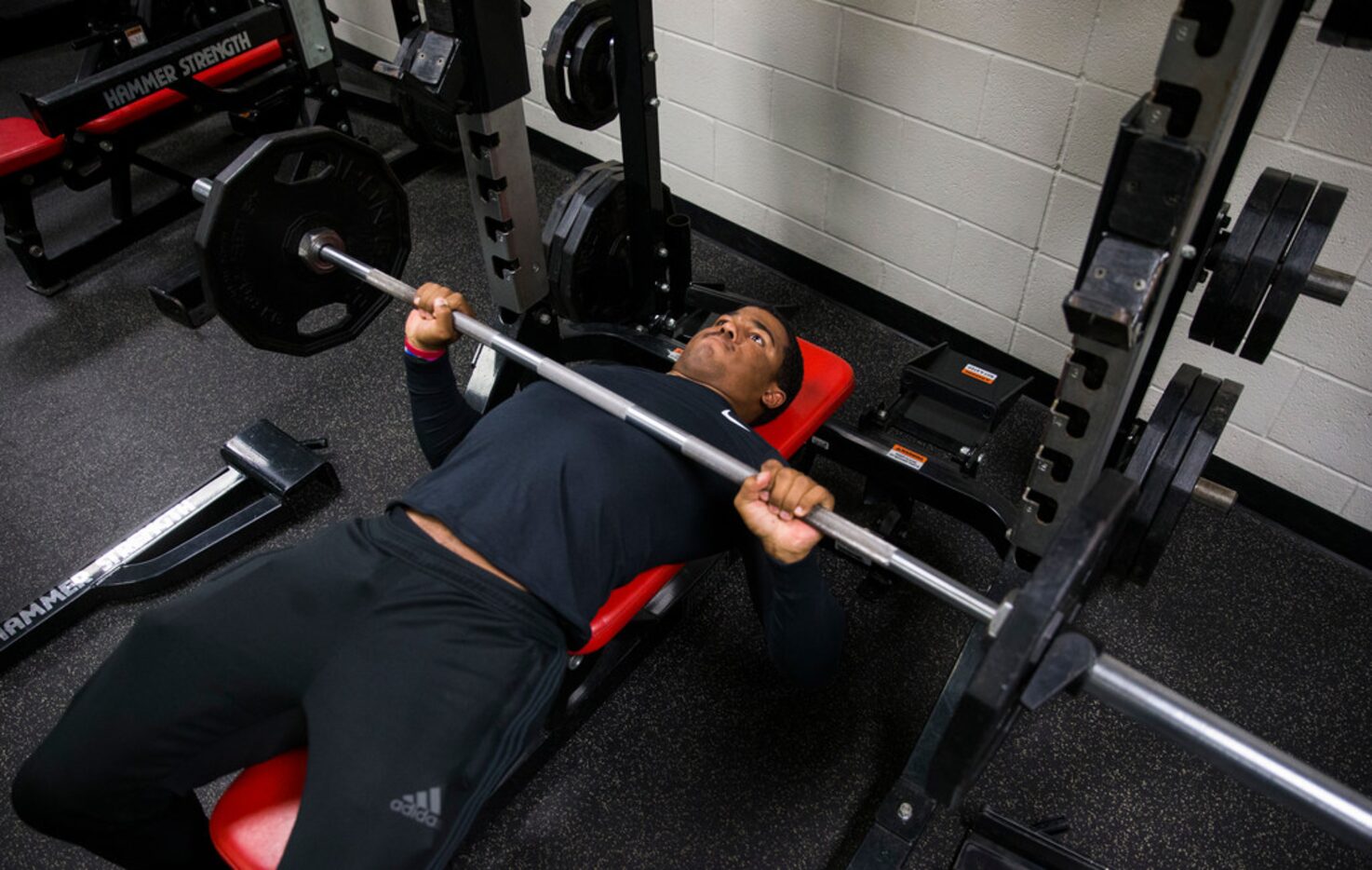 Mansfield Legacy football player Jalen Catalon works out in the weight room on Thursday,...