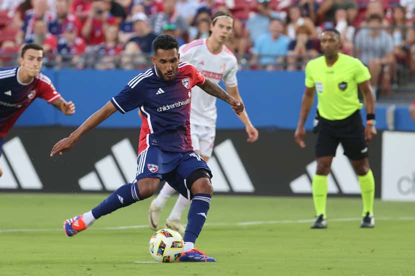 FC Dallas forward Jesús Ferreira shoots a penalty during the first half of an MLS soccer...