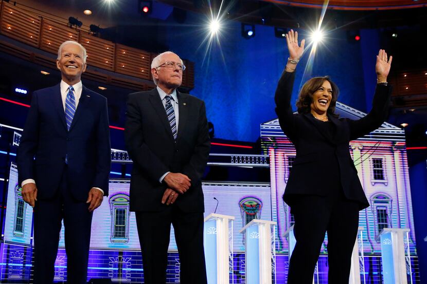 From left: Democratic presidential candidates Joe Biden, Sen. Bernie Sanders, I-Vt., and...