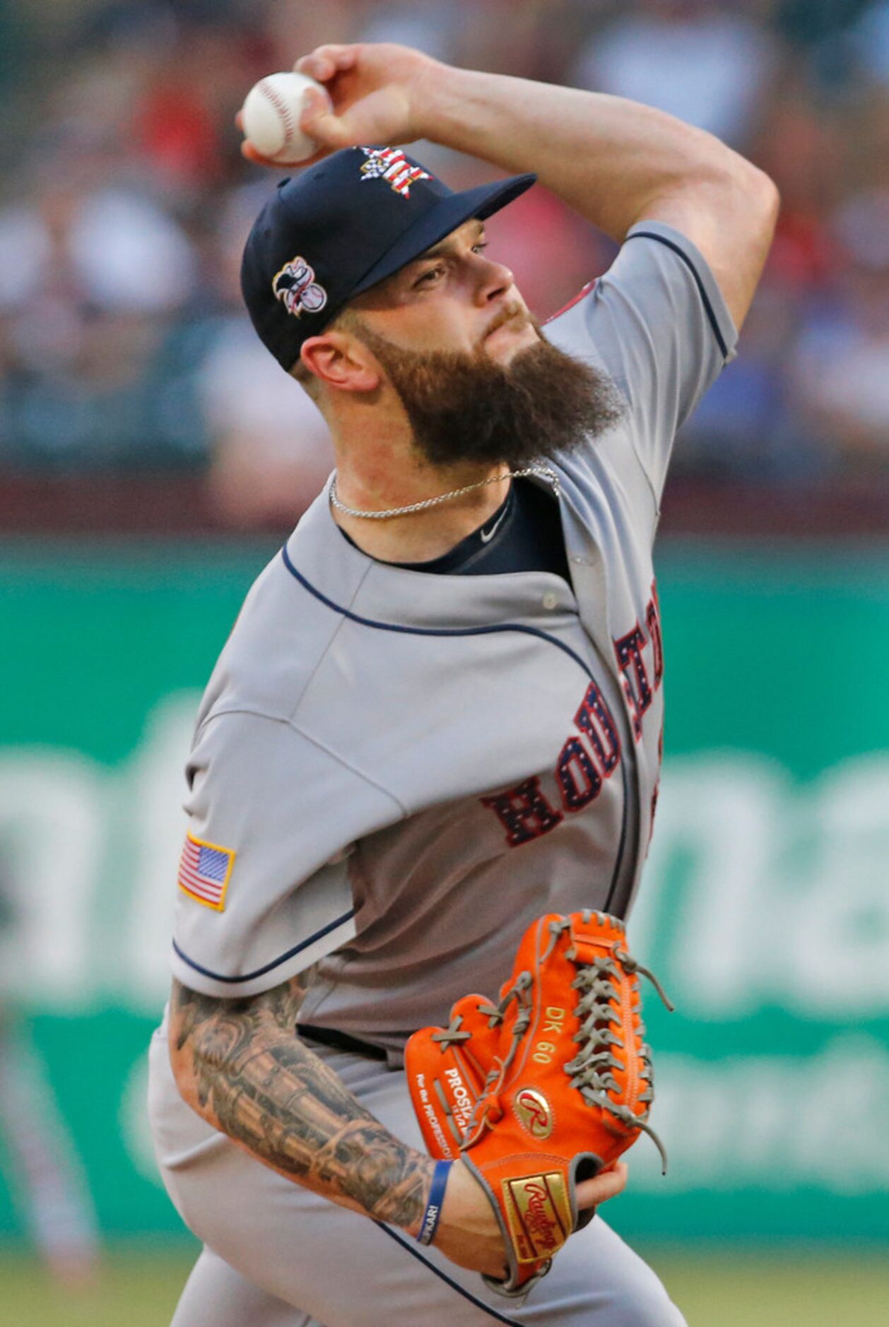 Houston Astros starting pitcher Dallas Keuchel (60) throws a pitch in the first inning...