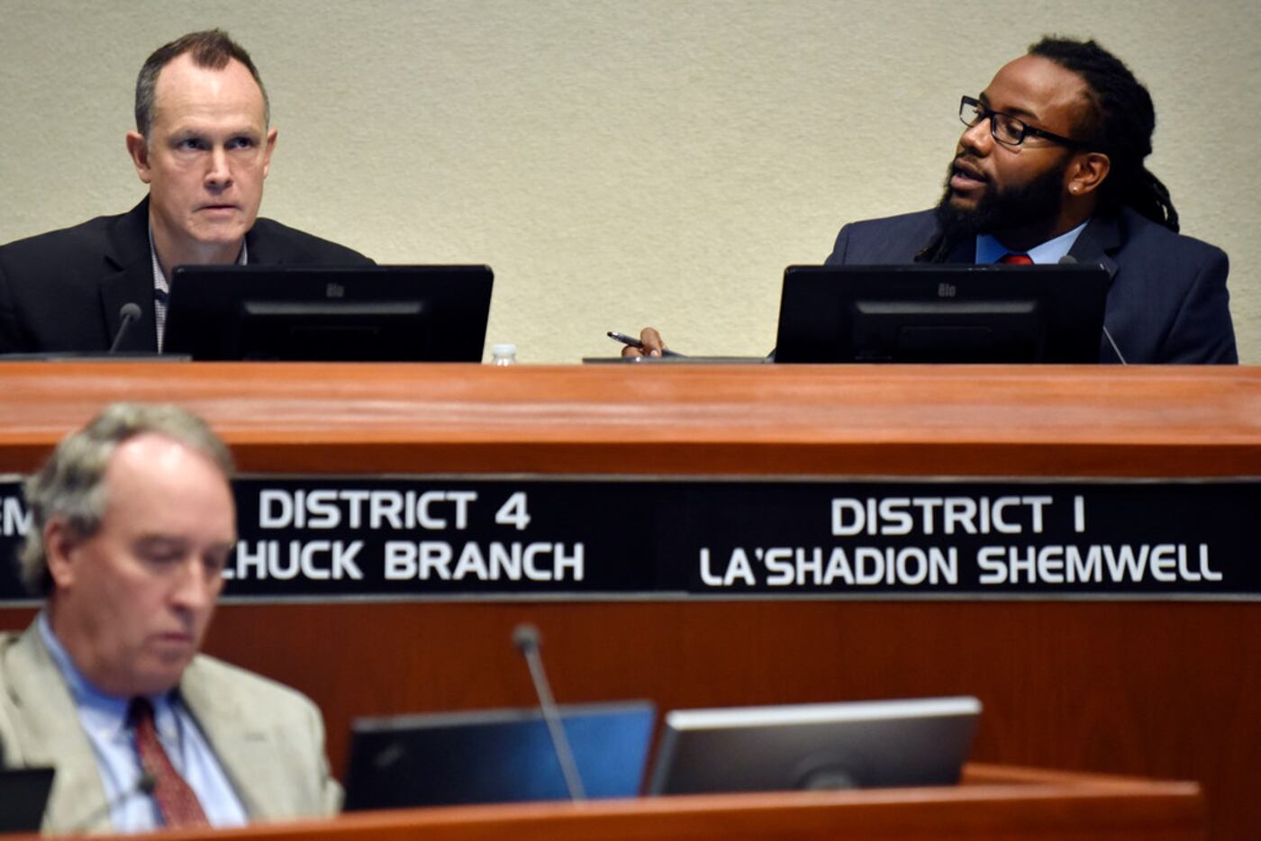 La'Shadion Shemwell (right) addresses the council during Tuesday's meeting as council member...