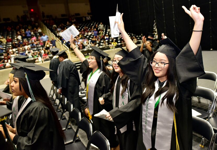 From left: Salutatorian Han Bao Tran, No. 3-ranked student Ngan Bao Tran and valedictorian...