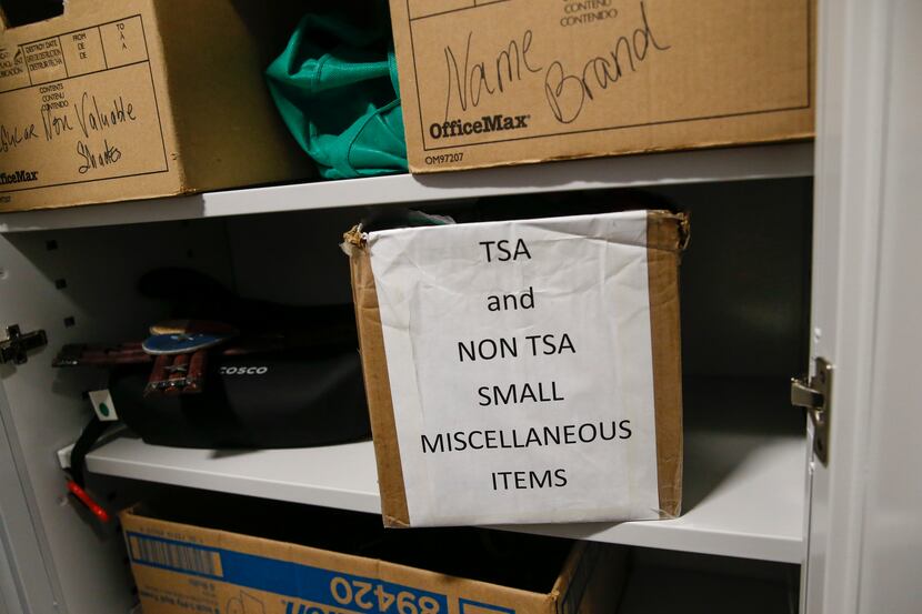 Items line the shelves of the lost and found office at Dallas Love Field.