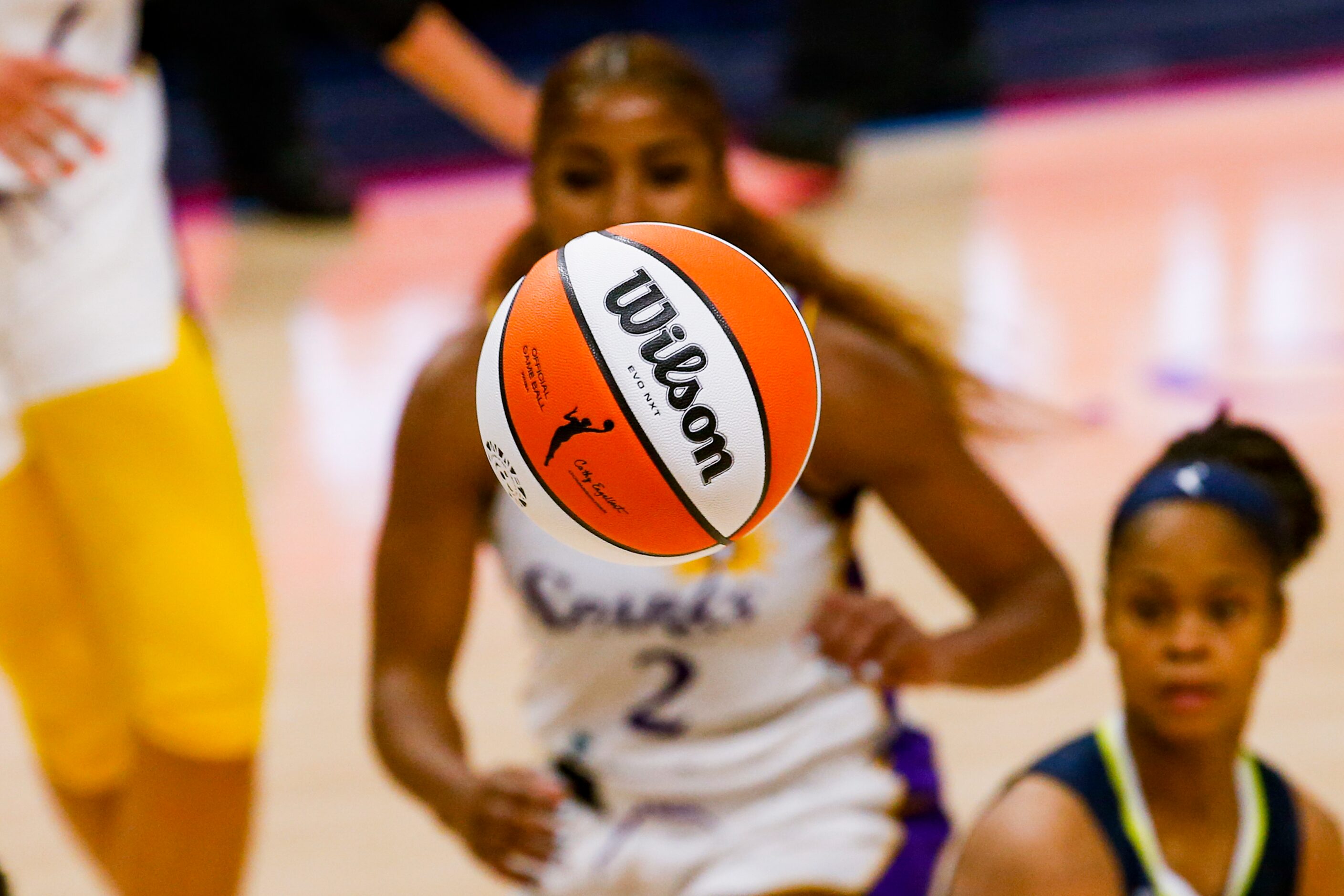 Players watch the ball during the fourth quarter of a Dallas Wings against the Los Angeles...