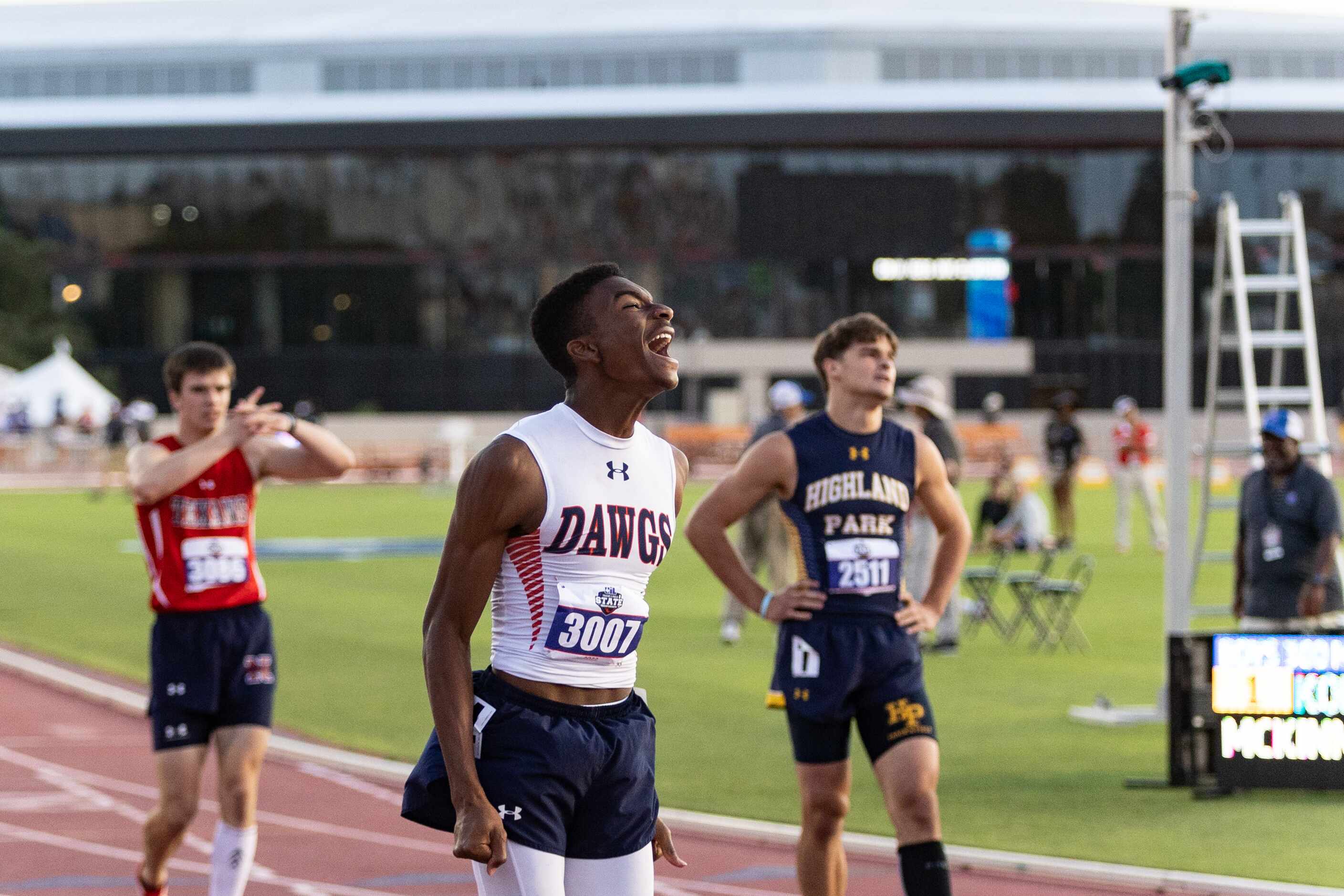 Kody Blackwood of McKinney North reacts after the boys’ 300m hurdles final at the UIL Track...