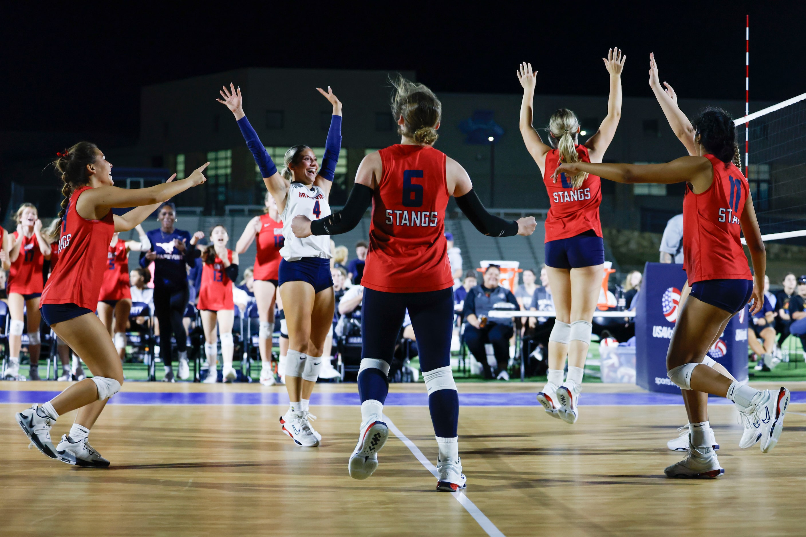 Grapevine High School players celebrate a point against  Liberty Christian School during the...