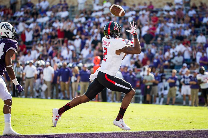 Texas Tech wide receiver Reginald Davis III (2) catches a 33-yard touchdown pass during the...