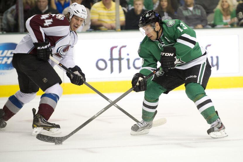 DALLAS, TX - NOVEMBER 1:  Ray Whitney #13 of the Dallas Stars controls a lose puck against...