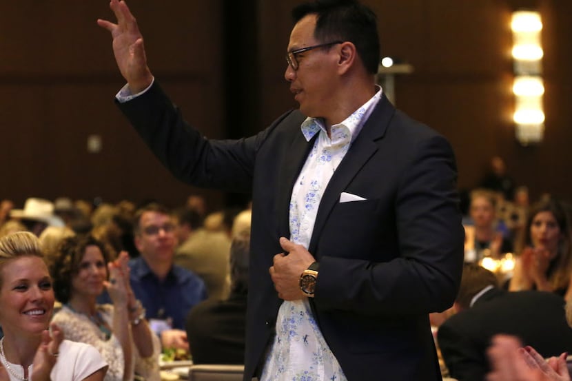 Dat Nguyen, former Dallas Cowboys linebacker and honorary celebrity chair for the event,...