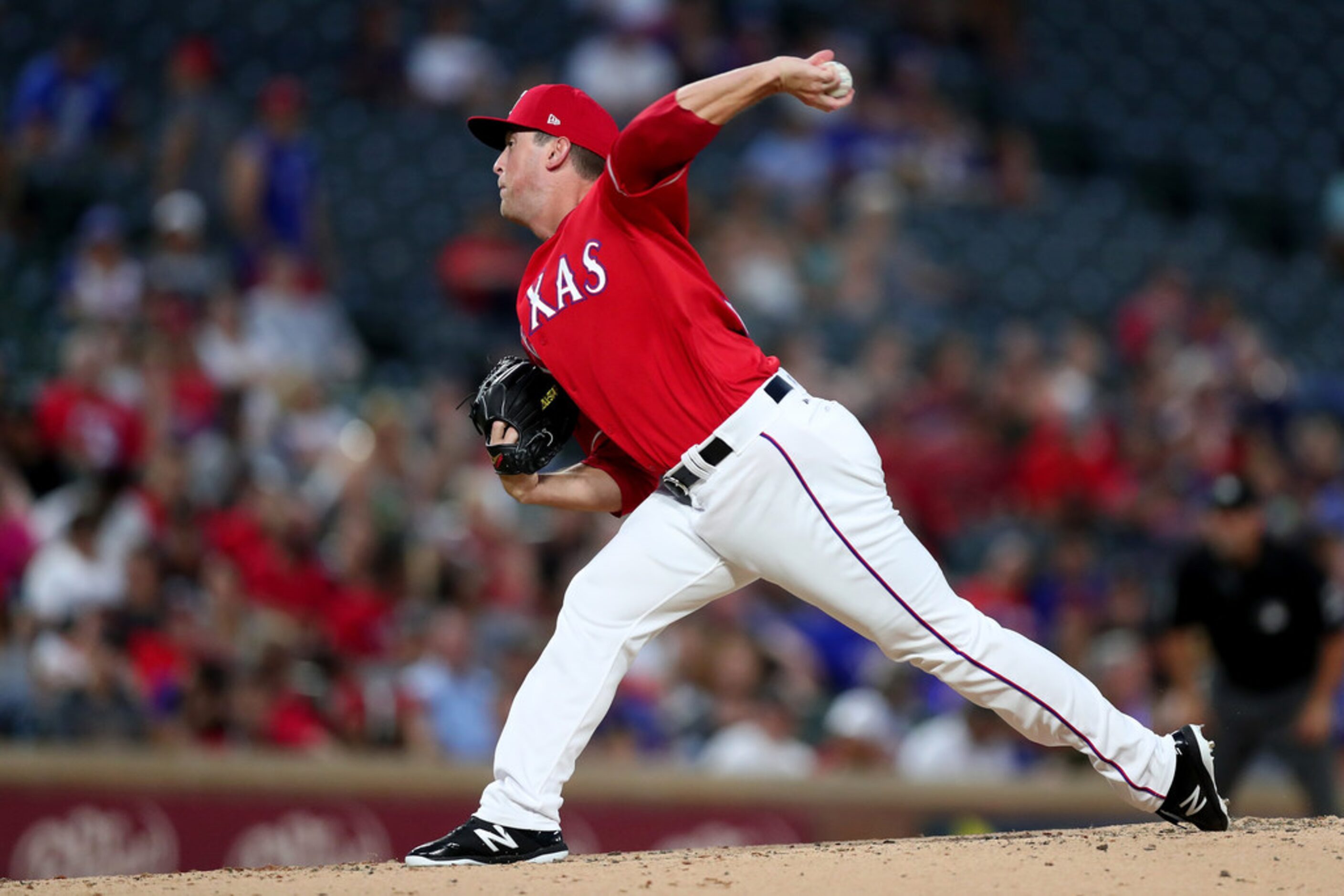 ARLINGTON, TX - AUGUST 14:  Jeffrey Springs #54 of the Texas Rangers pitches against the...