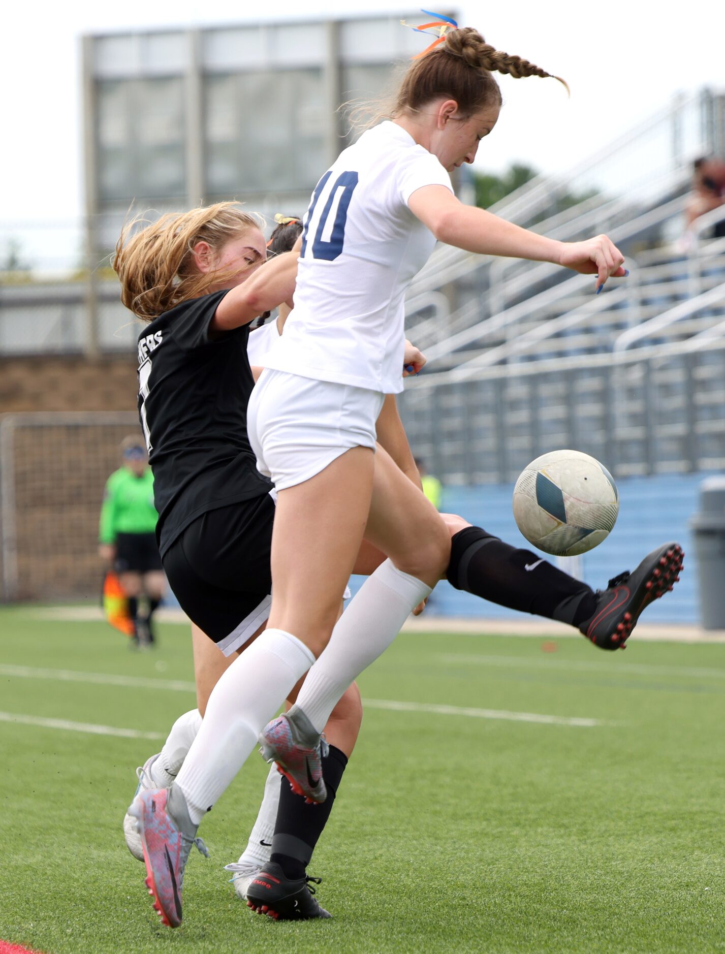  Frisco Wakeland defenseman Anna Mayer (10), foreground, and Colleyville Heritage forward...