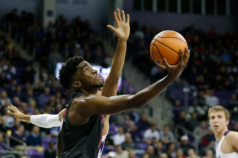 Southern Methodist Mustangs guard Shake Milton (1) attempts a layup after passing by TCU...