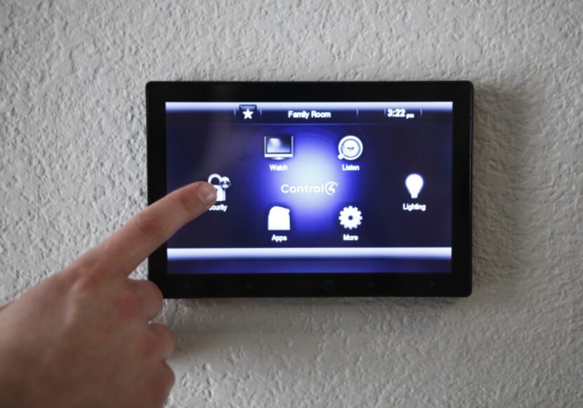 A Control4 Smart Home System allows a homeowner to control lights, television, security and...