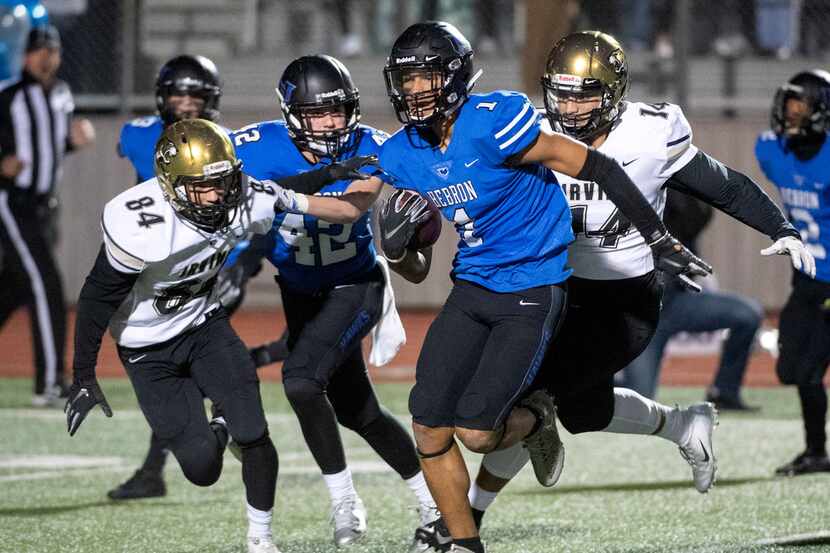 Hebron senior kick returner and Oklahoma commit Trejan Bridges (1) breaks away from the...