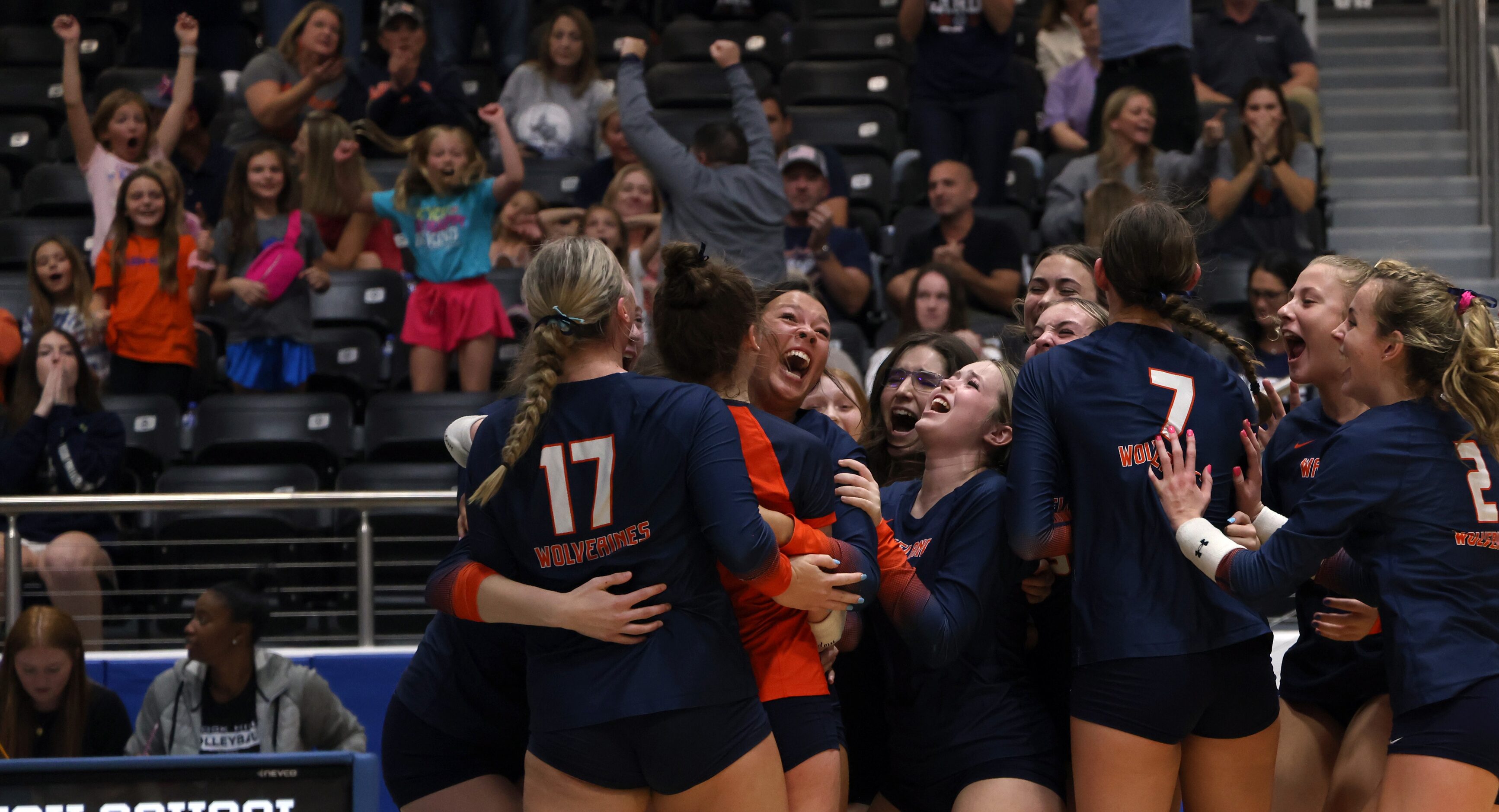 Frisco Wakeland players celebrate along with fans in the stands following their 5-set...