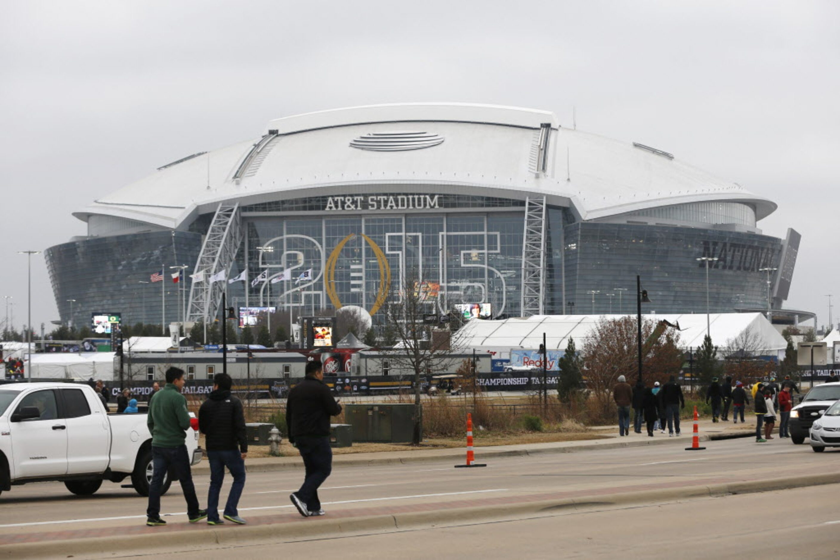 Fans make their way around the stadium before a game between Oregon and Ohio State...