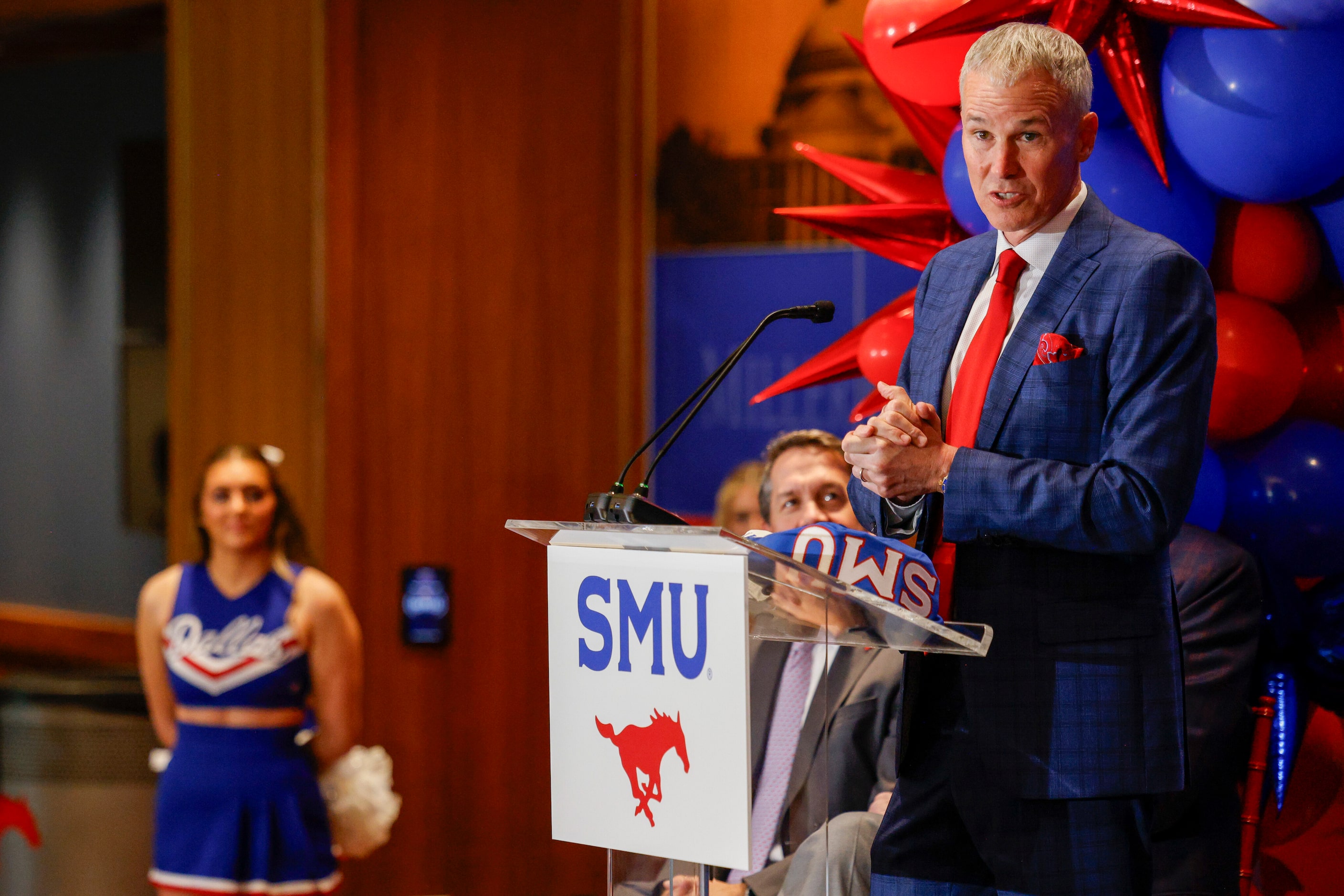 Head men's basketball coach Andy Enfield speaks during an introductory press conference,...