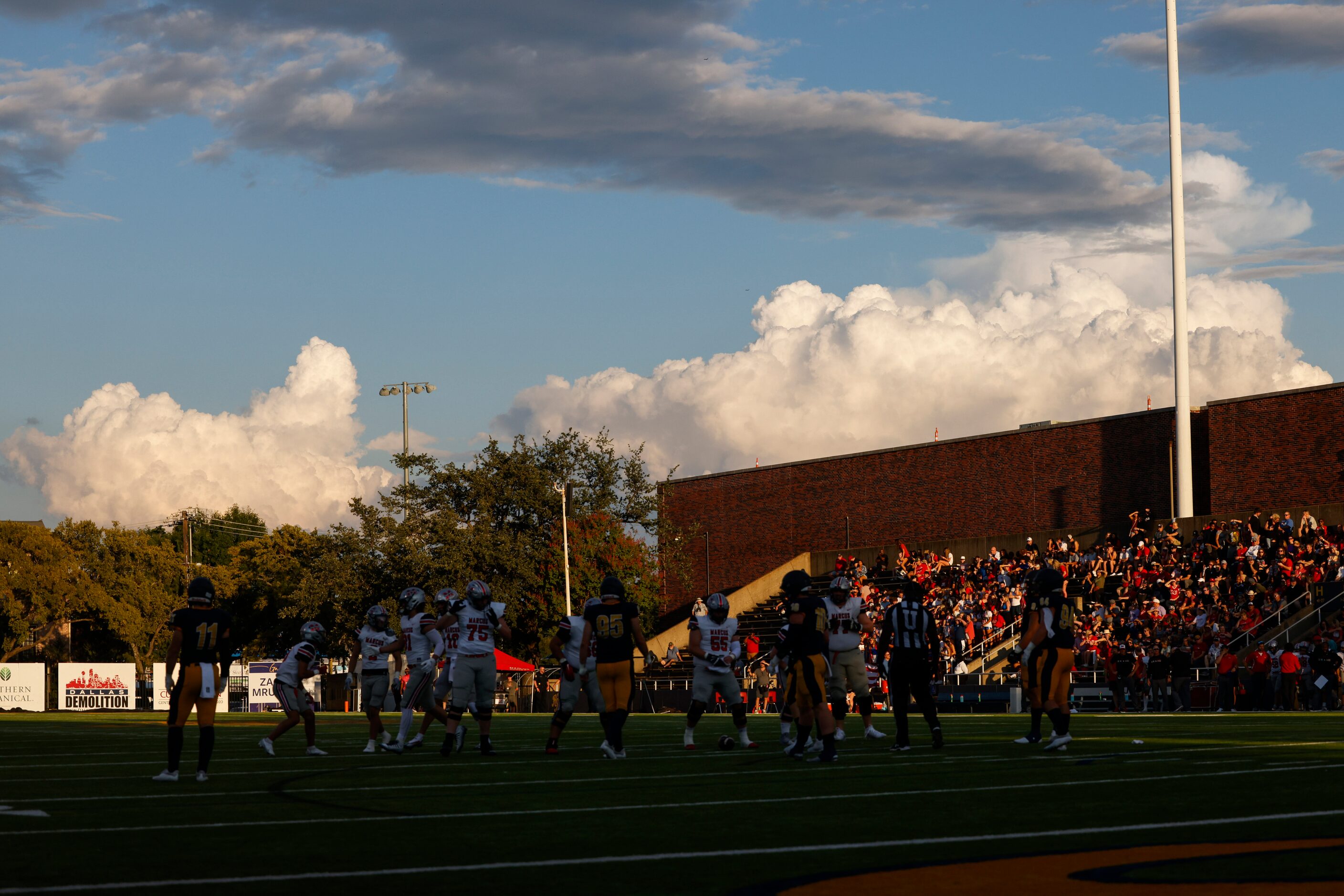 Highland Park and Flower Mound Marcus players line up during the first quarter of the...