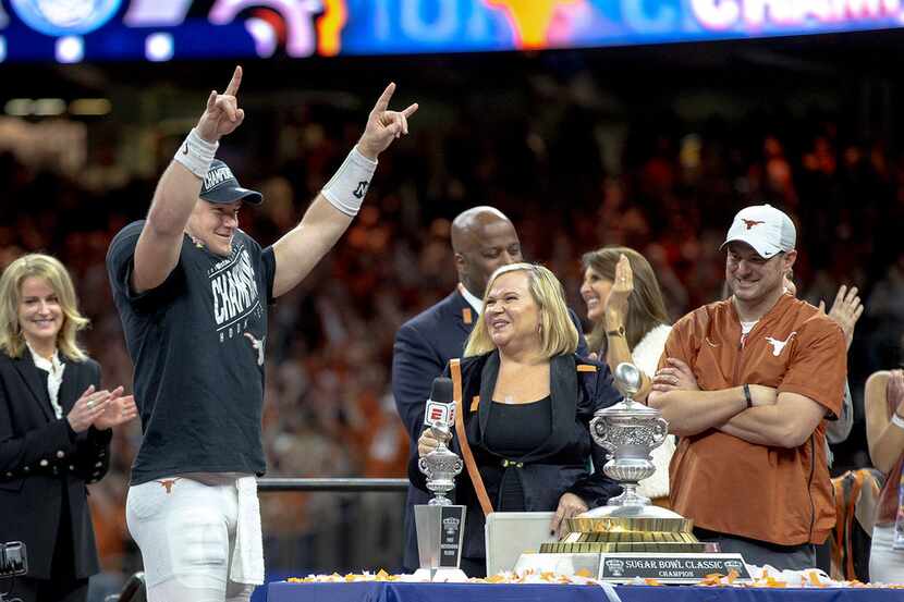 Texas quarterback Sam Ehlinger celebrates after defeating Georgia 28-21 in the Sugar Bowl...