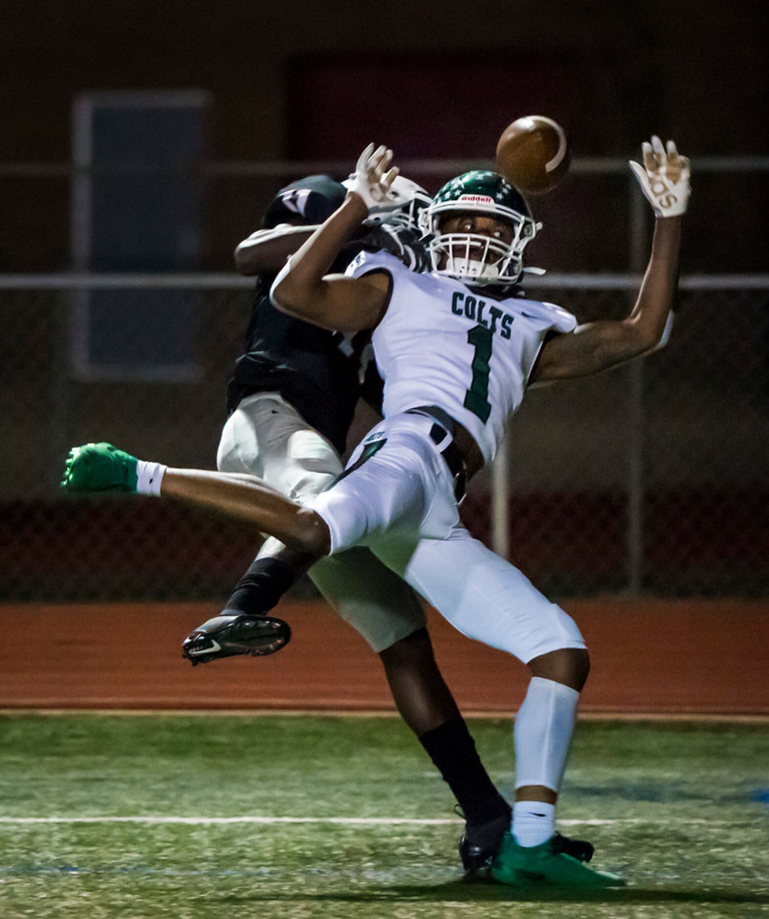 Arlington Bowie defensive back Jaylen Curvin (11) breaks up a pass intended for Arlington...