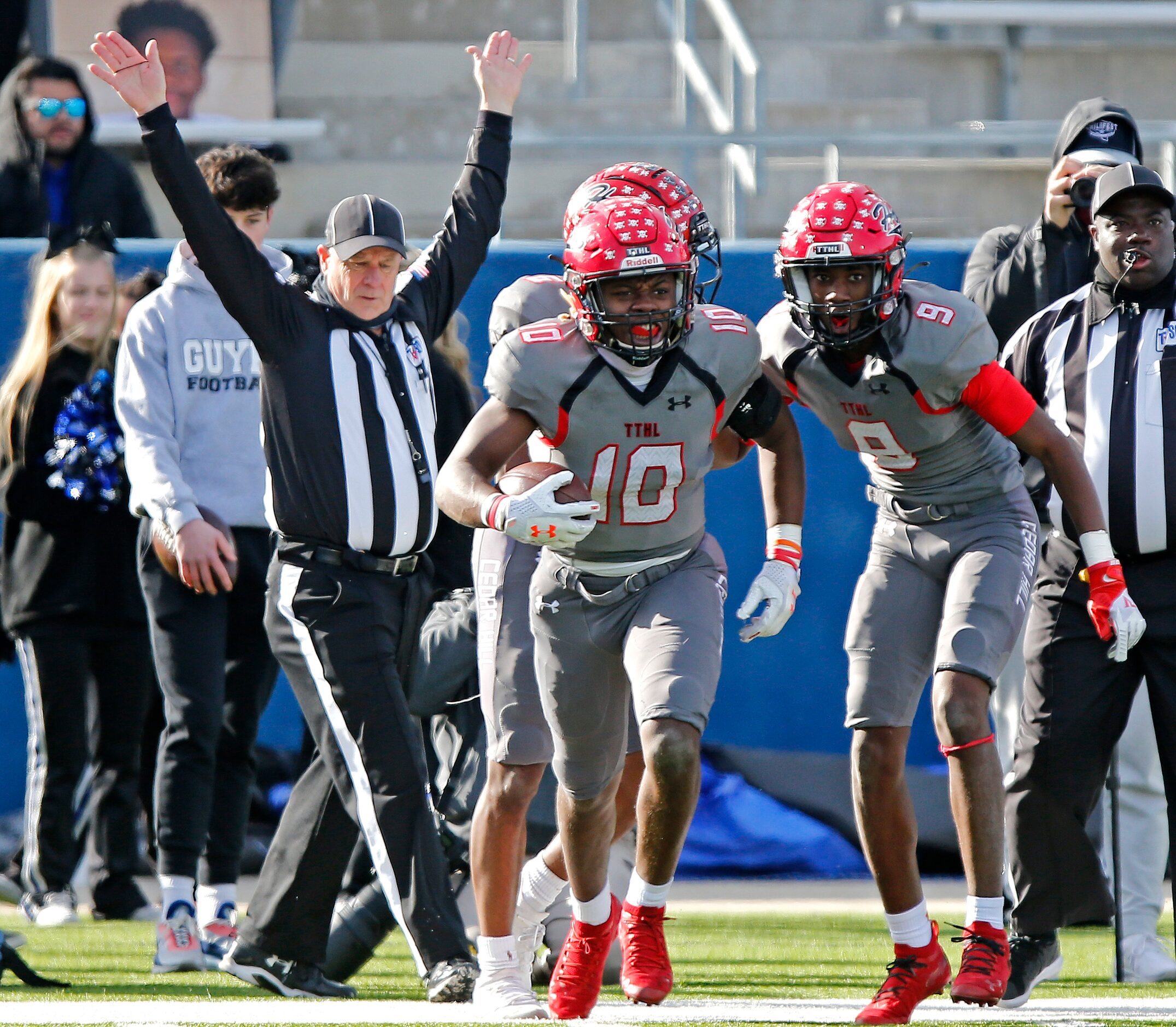 Cedar Hill High School linebacker Jaheim Lowe (10) runs away with the ball after making an...