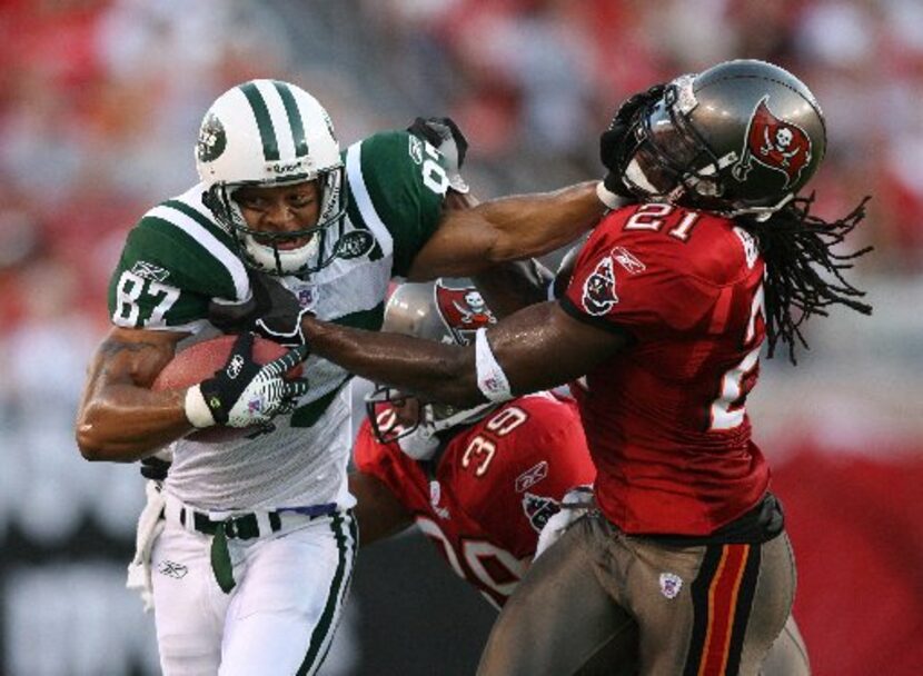 Aug 11, 2006; Tampa, FL, USA; New York Jets wide receiver (87) Laveranues Coles
 stiff arms...