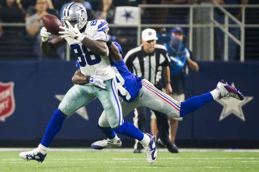 Dallas Cowboys wide receiver Dez Bryant (88) catches a pass as New York Giants cornerback...