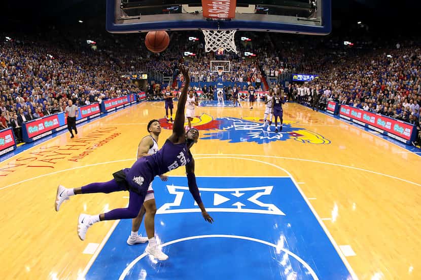LAWRENCE, KANSAS - JANUARY 09:  Kouat Noi #12 of the TCU Horned Frogs shoots as Quentin...