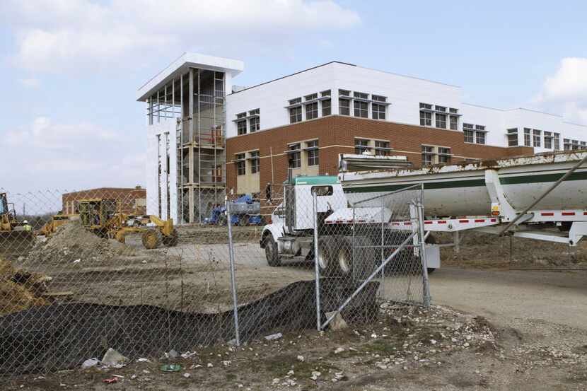 Construction is under way at Ann Richards Middle School in Pleasant Grove, one of five new...
